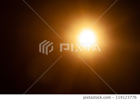 Sun flare on the black background Sun flare on the black background 119123776