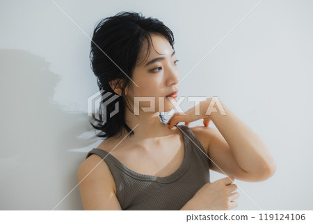 Woman in tank top 119124106