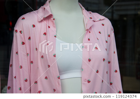 closeup of pink pajama for women with printed strawberries for fashion store showroom closeup of pink pajama for women with printed strawberries for fashion store showroom 119124374