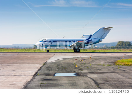 A small passenger airjet on the runway 119124730