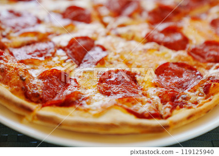 Close-up of pepperoni pizza.  119125940