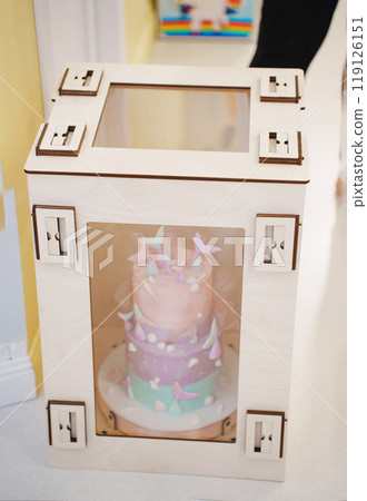 A cake shipping box. delivery and production of cakes and desserts. A cake shipping box. delivery and production of cakes and desserts. 119126151