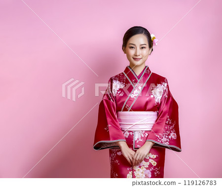 Woman wearing a kimono, pink background image Woman wearing a kimono, pink background image 119126783