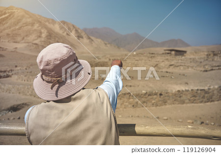 Tourist guide of the archaeological site of the Sacred City of Caral, Peru. 119126904