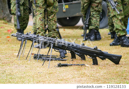 Japan Ground Self-Defense Force Type 89 rifles lined up on the ground 119128133