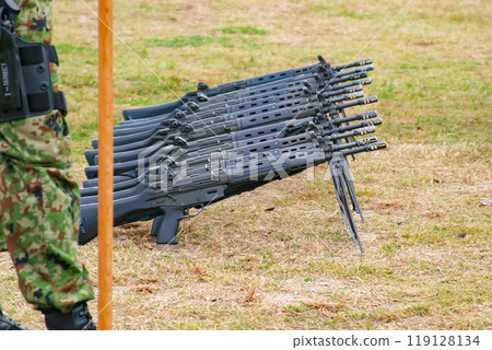 Japan Ground Self-Defense Force Type 89 rifles lined up on the ground Japan Ground Self-Defense Force Type 89 rifles lined up on the ground 119128134