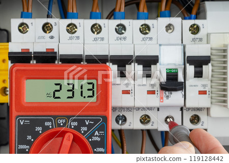 Electrical Testing with Multimeter in Breaker Panel 119128442