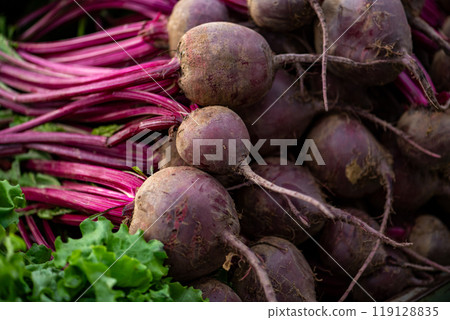 red beetroot displayed on a farmer's market counter 119128835