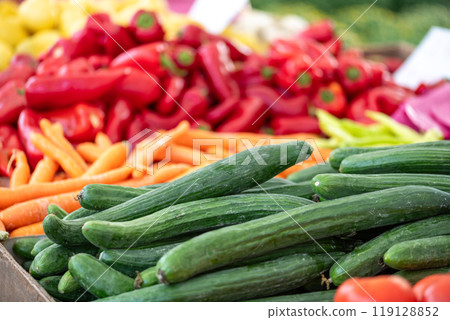 Fresh vegetables displayed on a farmer's market counter 119128852
