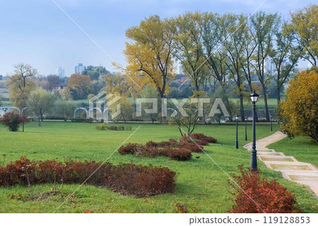 ladder and park bench with lantern 119128853