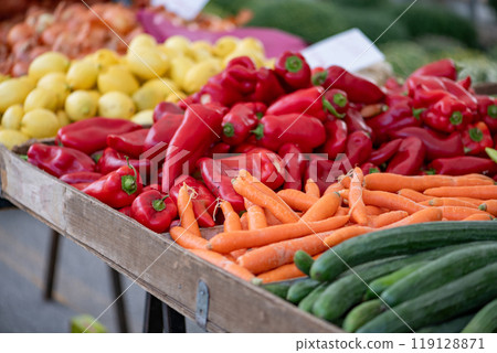 Fresh vegetables displayed on a farmer's market counter 119128871