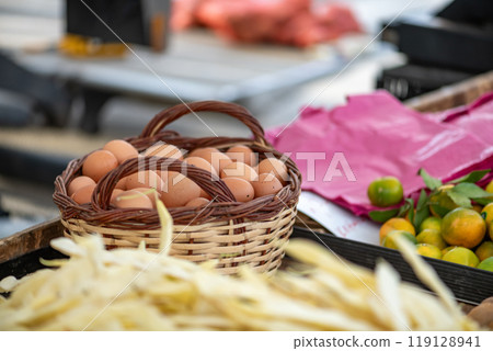 Fresh eggs displayed on a farmer's market counter 119128941