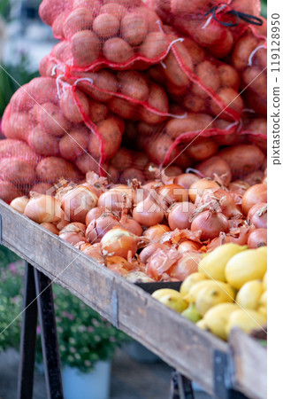 Fresh vegetables displayed on a farmer's market counter 119128950