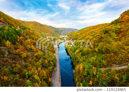 mountain river at sunset. landscape of romania in autumn. somes river in apuseni mountains in fall season. beautiful scenery of european countryside. colorful outdoor environment 119128965