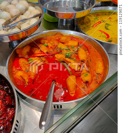 Closeup of squid curry that is ready to be served at the famous kandar rice shop here. 119129071