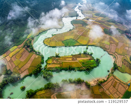 Aerial drone view of rice terrace paddle field around the river at Phong Nam, Trung Khanh, Cao Bang, Vietnam Aerial drone view of rice terrace paddle field around the river at Phong Nam, Trung Khanh, Cao Bang, Vietnam 119129537