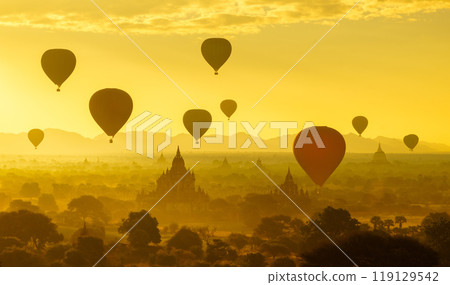 Balloon over plain of Bagan in misty morning, Myanmar 119129542