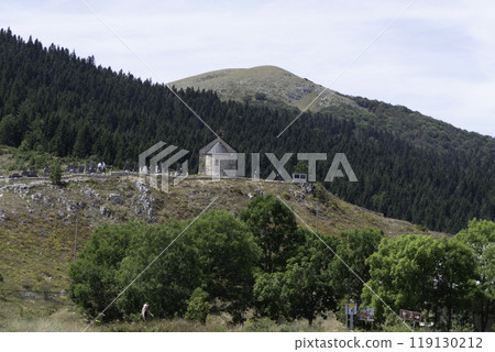 Montenegro, Durmitor National Park landscape. Church and cemetery.. 119130212