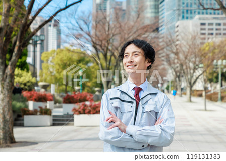 Young engineer walking in the office district 119131383