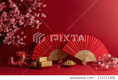 Decorative Chinese New Year celebration display with red fans, gold ingots, and cherry blossoms 119131866
