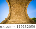 View from below of the Roman triumphal arch of Orang city 119132059