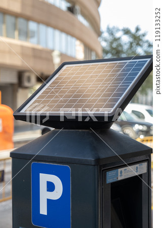 Solar panel powered urban parking meter 119133252
