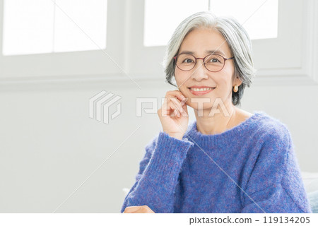 Senior woman with glasses Senior woman with glasses 119134205
