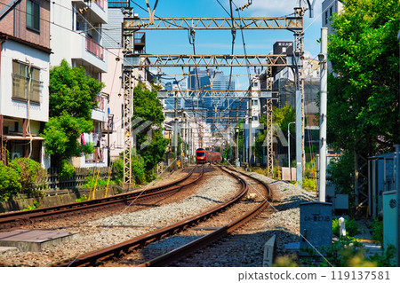 Odakyu Line Romancecar GSE Express running through a residential area Odakyu Line Romancecar GSE Express running through a residential area 119137581
