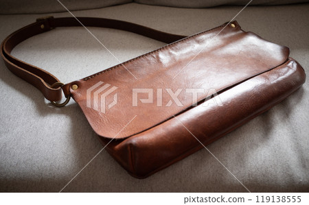 Worn leather bag 119138555