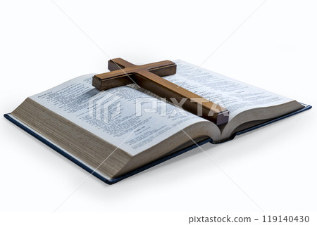 Wooden religion cross and opened blue book of Holy Bible isolated over white background. Religious christian holiday. Symbol of faith in God, Christianity Feast 119140430