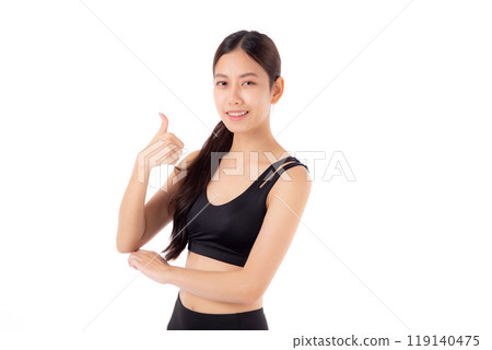 Portrait of beautiful young asian woman in sportswear gesture thumbs up with success isolated. 119140475