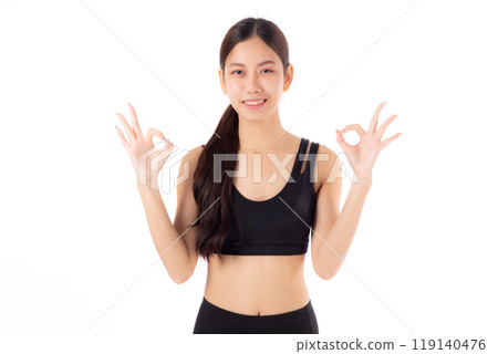 Portrait of beautiful young asian woman in sportswear gesture success isolated. 119140476