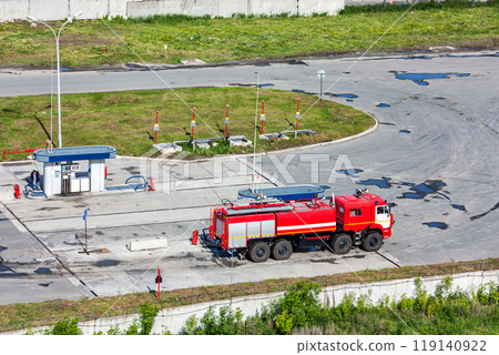 Airfield fire truck at a gas station 119140922