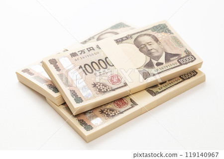 A stack of 10,000 yen bills on a white background A stack of 10,000 yen bills on a white background 119140967