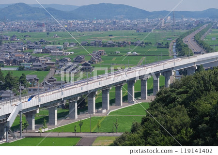 Hokuriku Shinkansen as seen from Mt. Iwanai (north direction, Sabae City) Echizen City, Fukui Prefecture 119141402