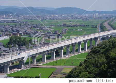 Hokuriku Shinkansen as seen from Mt. Iwanai (north direction, Sabae City) Echizen City, Fukui Prefecture 119141403