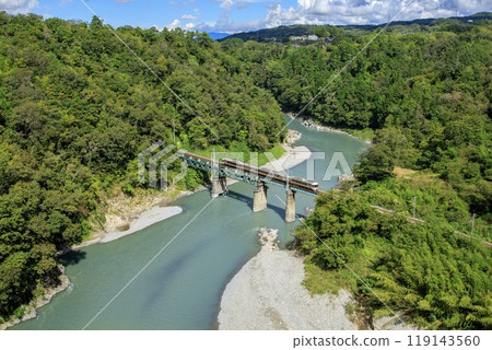 Limited Express Inaji crossing the Tenryu River in Iida City Limited Express Inaji crossing the Tenryu River in Iida City 119143560