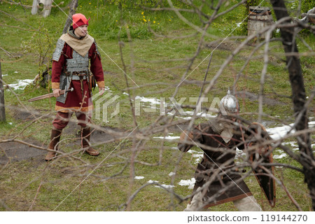Participating in Medieval Battle Reenactment Outdoors 119144270