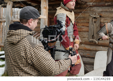 Filming Medieval Scene with Camera Equipment 119144289