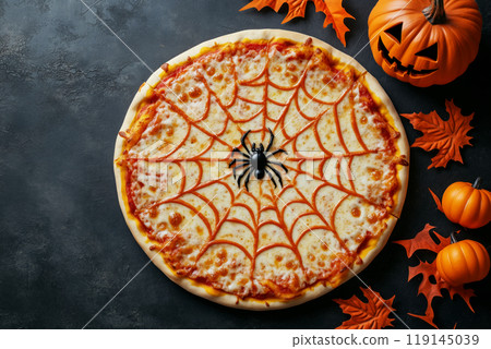 Pizza with cheese spider web toppings, black olives, and spider decorations on black background with pumpkin. Halloween Pizza with cheese spider web toppings, black olives, and spider decorations on black background with pumpkin. Halloween 119145039