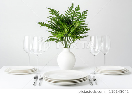 Elegant vase with flowers, plates, cutlery and wine glasses on white background. Concept of home decor and table setting 119145041