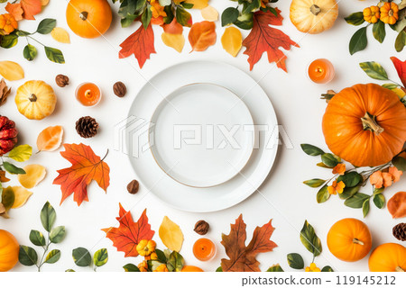 Empty white plate with fork and knife, surrounded by pumpkins, leaves on white background. Thanksgiving concept 119145212
