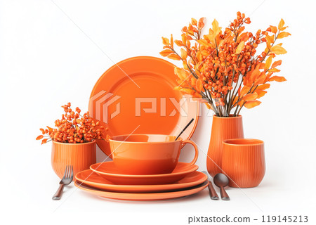 Autumn table setting with bowls, plates, wine glasses, pumpkins and floral centerpiece in vase on soft focus background. 119145213