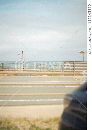 Beach across the road 119145530