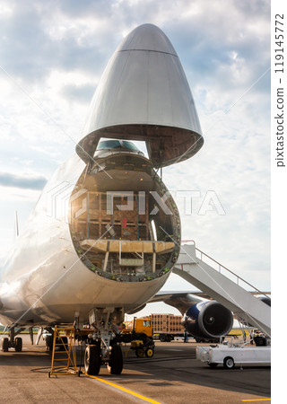 Unloading widebody cargo transport aircraft Unloading widebody cargo transport aircraft 119145772