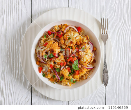 cauliflower chickpea quinoa salad in a white bowl cauliflower chickpea quinoa salad in a white bowl 119146269