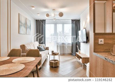 A Modern Living Room that Showcases an Elegant Design and Creates a Cozy, Inviting Atmosphere 119146282