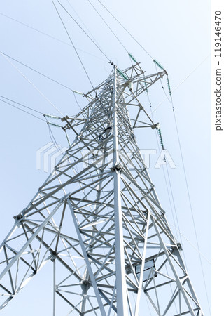 High-voltage power line support against the blue sky 119146470