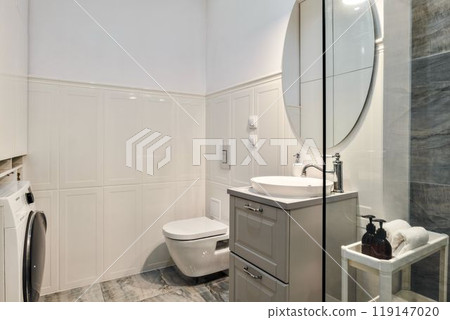 A Modern Minimalist Bathroom that Incorporates Stylish Fixtures and Contemporary Design 119147020