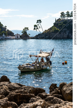Greece Parga. Panagia island off the coast of Parga, small chapel and trees on the rock Greece Parga. Panagia island off the coast of Parga, small chapel and trees on the rock 119147034